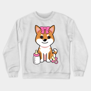 cute baby orange dog wears a pink ribbon Crewneck Sweatshirt